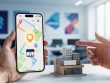 Smartphone displaying a non-text local location pin over a storefront silhouette, symbolizing Google Business Profile’s role in local SEO visibility.